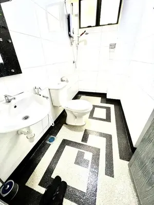 a bathroom with a toilet and a sink at 2BR The Yeop Ipoh Homestay Apartment Casa Kayangan Bandar Meru Raya in Ipoh