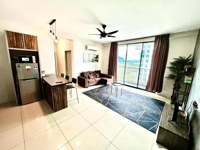 a kitchen and living room with a ceiling fan at 2BR The Yeop Ipoh Homestay Apartment Casa Kayangan Bandar Meru Raya in Ipoh