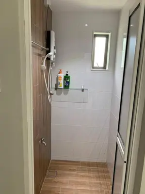 a shower stall in a bathroom with a window at Traditional Villa with Modern Design 3R2B in Ipoh