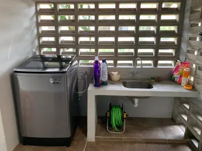 a small kitchen with a sink and a sink at Traditional Villa with Modern Design 3R2B in Ipoh