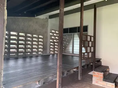 a room with a wooden floor and wooden stairs at Traditional Villa with Modern Design 3R2B in Ipoh
