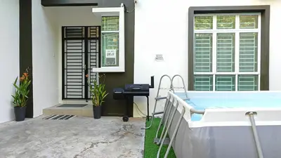 a hot tub in front of a house at Ocean 25 Shamrock Beach Big Group 6 Bedroom 5 Bathroom with Pool in Tanjung Bungah