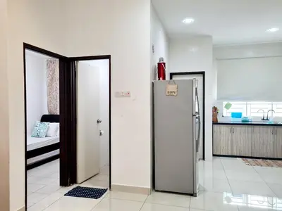 a room with a refrigerator and a kitchen at Ocean 25 Shamrock Beach Big Group 6 Bedroom 5 Bathroom with Pool in Tanjung Bungah