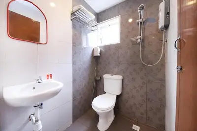 a bathroom with a toilet and a sink at Heaven Mountain Hill Hotel 1 Cameron Highlands in Cameron Highlands