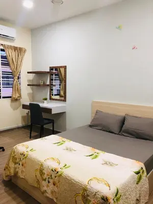 a bedroom with a bed and a desk and a chair at Seri Manjung HomeStay @Spacious Family Home in Seri Manjung
