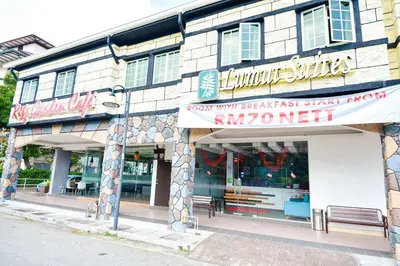 a store front of a building on a street at Ritz Suites in Lumut