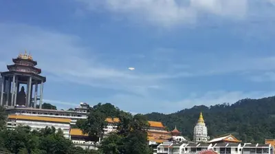 a view of a city with buildings and trees at COMFORTABLE STAY in Ayer Itam
