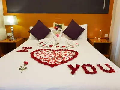 a bed with a heart made out of red roses at Cameron Nova Highlands Resort I in Cameron Highlands