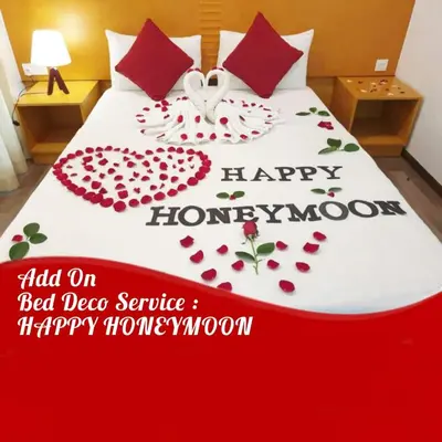 a bed with a happy honeymoon written on it at Cameron Nova Highlands Resort I in Cameron Highlands