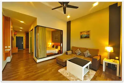 a living room with a couch and a bed at Cameron Nova Highlands Resort I in Cameron Highlands