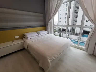 a bedroom with a white bed and a large window at Strait Garden Studio X Ace Pro @ George Town in George Town