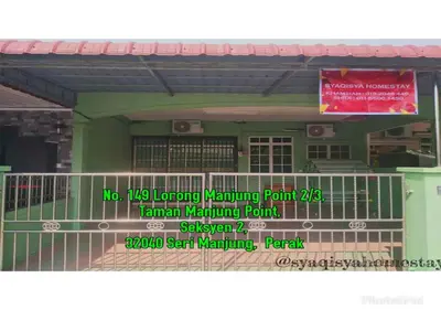 a sign on the front of a building at Syaqisya Homestay in Seri Manjung
