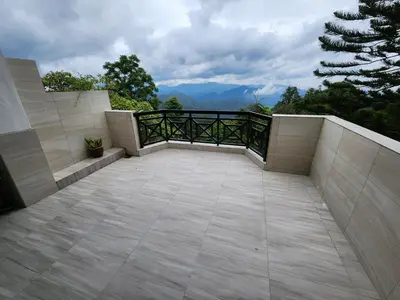 a balcony with a view of the mountains at Little England B5-2 Fraser Panorama in Bukit Fraser