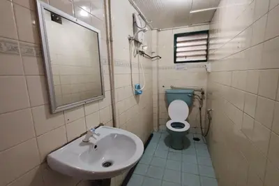 a bathroom with a sink and a toilet at Hotel Check Inn 2 Cameron Highlands in Brinchang