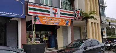 a store front with cars parked in front of it at My Homestay N16 (14 pax) @ Golden Hills Night Market in Brinchang