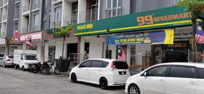 a group of cars parked on a city street at My Homestay N16 (14 pax) @ Golden Hills Night Market in Brinchang