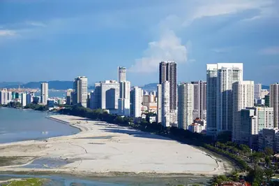 a beach in front of a city with tall buildings at The Landmark by Katana 4BR Luxury Seaview Homestay Gurney\u65e0\u654c\u6d77\u666f\u56db\u623f\u5957\u623f in Tanjong Tokong