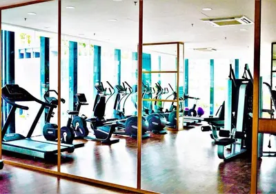 a gym with a bunch of tread machines in it at The Landmark by Katana 4BR Luxury Seaview Homestay Gurney\u65e0\u654c\u6d77\u666f\u56db\u623f\u5957\u623f in Tanjong Tokong