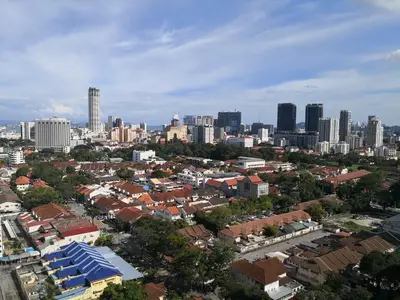 an aerial view of a city with tall buildings at Mansion One, Private Room in George Town