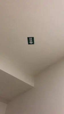 a sign on the ceiling of a room at Hasnifana Homestay Seri Iskandar in Seri Iskandar