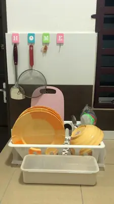 a bathroom with a toilet with a plate on it at Hasnifana Homestay Seri Iskandar in Seri Iskandar