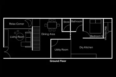 a black and white floor plan of a room at Ipoh Garden Homestay in Ipoh
