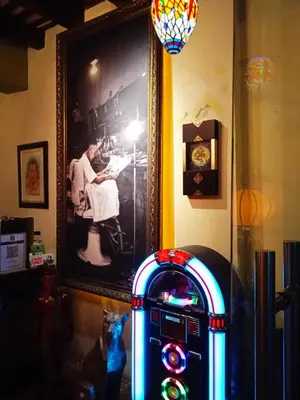 a parking meter in a room with a picture on the wall at Cintra House in George Town