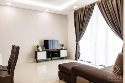 a living room with a couch and a tv at Lovely Home Casa Kayangan A2207 in Ipoh