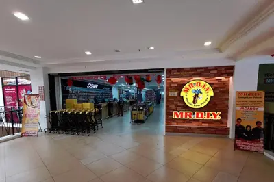 a mr dry restaurant with a mr day sign in a mall at Aranda Nova Suite in Cameron Highlands