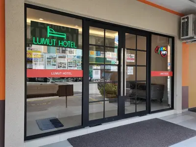 a store front window of a furniture store at Lumut Hotel in Lumut