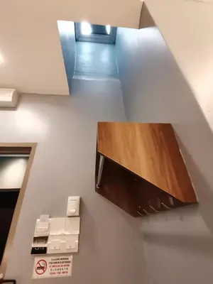 a stairwell with a sink in a room at Lumut Hotel in Lumut