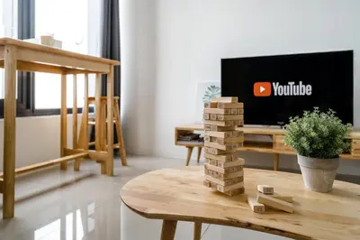 a living room with a wooden block tower on a table at Muji Studio 1 - Seaview at 218 Tropicana Near Komtar Food Heaven with Netflix & TV Box in George Town