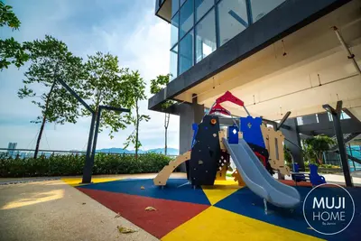 a playground at a building with a slide at Muji Studio 1 - Seaview at 218 Tropicana Near Komtar Food Heaven with Netflix & TV Box in George Town