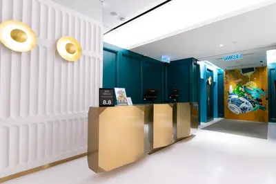 a lobby with a row of donuts on the wall at The Upper House, Batu Kawan in Batu Kawan