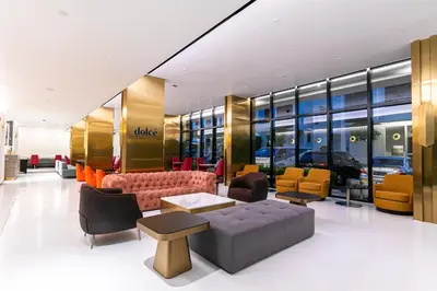a lobby of a store with couches and chairs at The Upper House, Batu Kawan in Batu Kawan