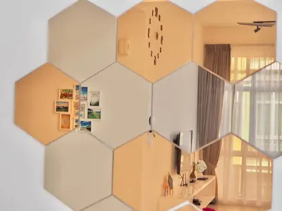 a room with a wall with a hexagon design at The PENT Duplex Cameron in Tanah Rata