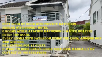 a building with a sign that reads raw teeth by room with prairiepayerpayer at WeJDAN INN BALIK PULAU, PENANG ISLAND in Balik Pulau