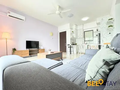 a living room with a couch and a tv at Ipoh Meru Casa Kayangan by BeeStay in Ipoh