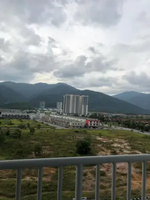 a view of a city with mountains in the background at KJ Homestay Casa Kayangan in Ipoh