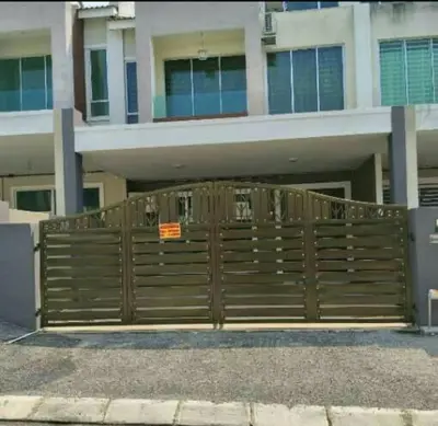 a wooden fence in front of a building at Idham Homestay in Ipoh