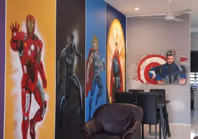 a meeting room with superheroes painted on the wall at Marvel Cinematics Homes@ Station 18 , Ipoh in Ipoh