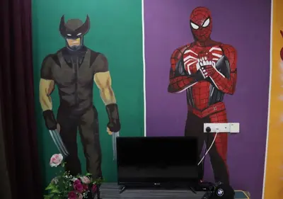 a mural of a spider man and a superhero at Marvel Cinematics Homes@ Station 18 , Ipoh in Ipoh