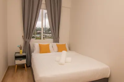a bedroom with a white bed with a window at Cameron Highlands Modern7-Tea Plantation View-Premium Hotel Bed in Kampung Kuala Terla