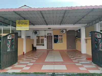 a building with a sign on the front of it at Homestay D'Lily in Ipoh