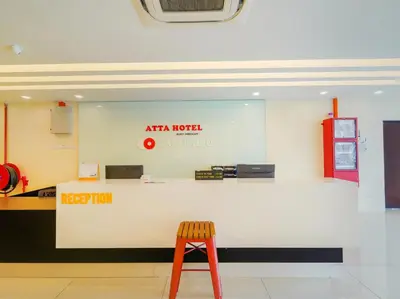 a counter in a store with a stool in front at Avatel Bukit Mertajam in Bukit Mertajam