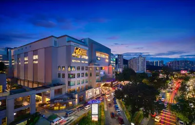 a building in a city at night with traffic at Landmark by Katana 3BR Romantic Luxury Seaview Homestay Gurney\u65e0\u654c\u6d77\u666f\u4e09\u623f\u5957\u623f in Tanjong Tokong