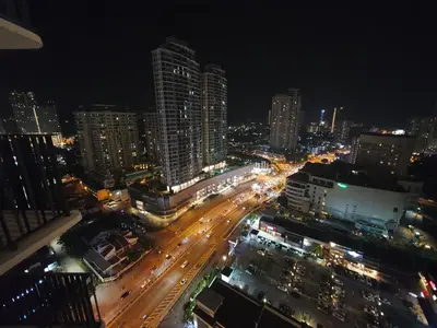 a city at night with traffic on a busy street at Landmark by Katana 3BR Romantic Luxury Seaview Homestay Gurney\u65e0\u654c\u6d77\u666f\u4e09\u623f\u5957\u623f in Tanjong Tokong