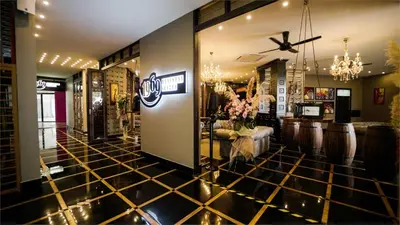 a salon with a gold tiled floor at 1969 Business Suites @ Ipoh Garden in Ipoh