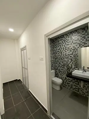 a bathroom with a toilet and a sink at YipStay in Gopeng