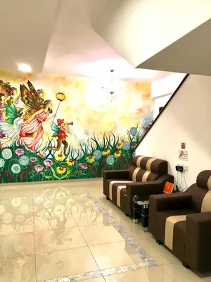 a room with a large painting on the wall at Art Heritage at Lucky 7 in Ipoh